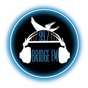 99.7 FM